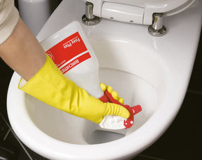 Photo of an individual using the Birchmeier Foxy Plus on a toilet.
