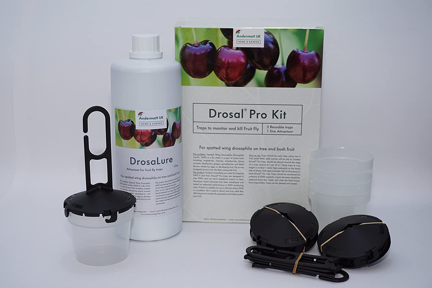 Photo of a full Drosa kit. The kit contains 5 Drosal® Pro traps and 1 L DrosaLure liquid attractant.