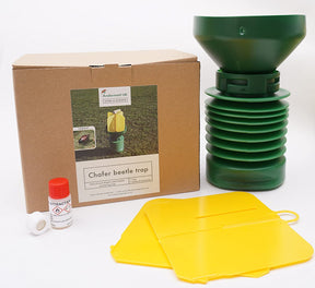 Photo of the full unboxing of a chafer beetle trap. This contains the funnel and liquid attractant.